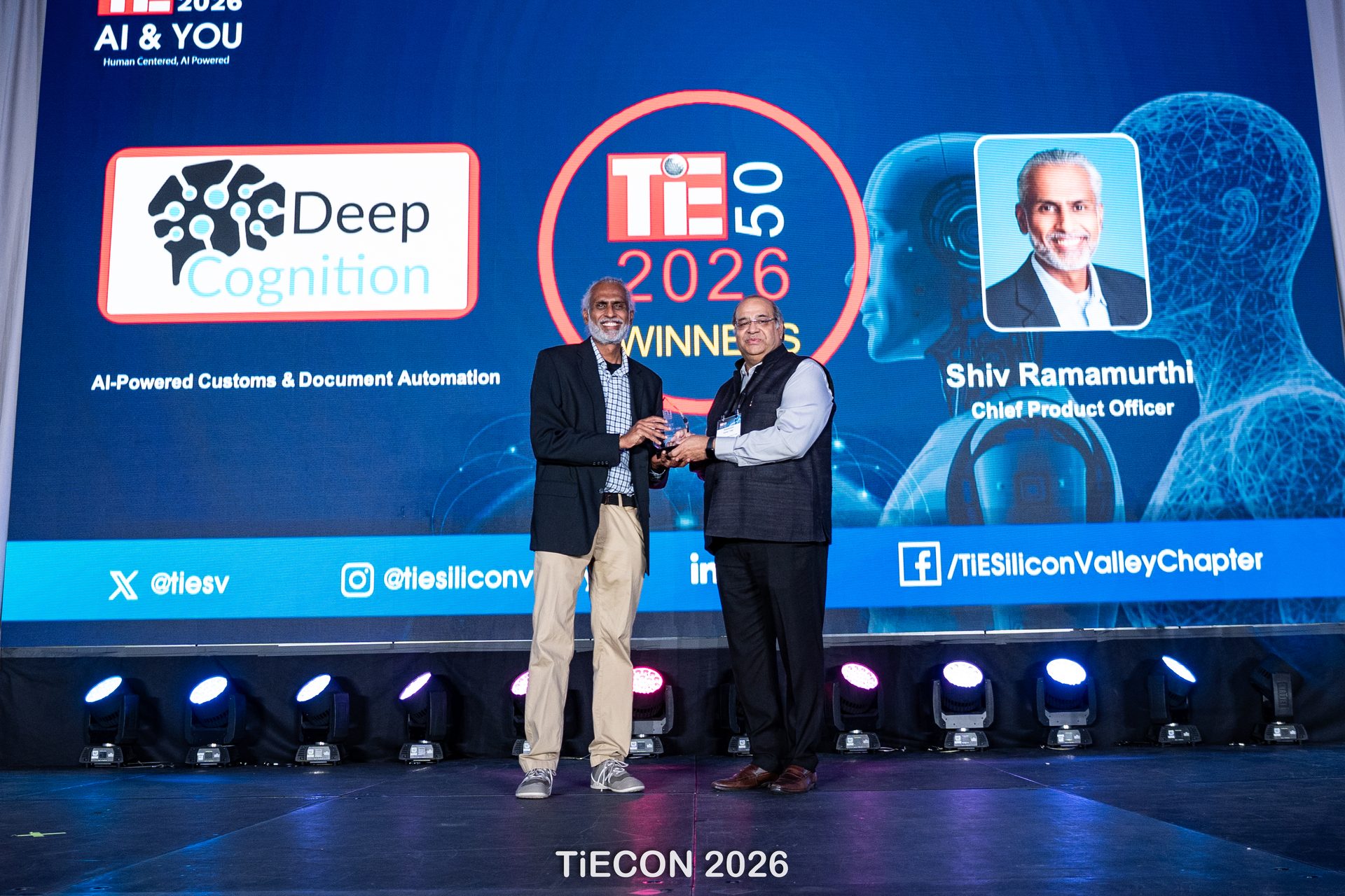 Shiv Ramamurthi, Chief Product Officer, accepting the TiE50 2026 award for Deep Cognition on stage at TiECON 2026